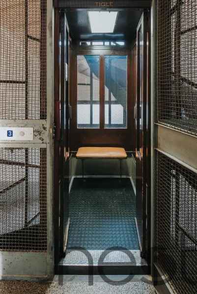 Old-fashioned elevator with high technology